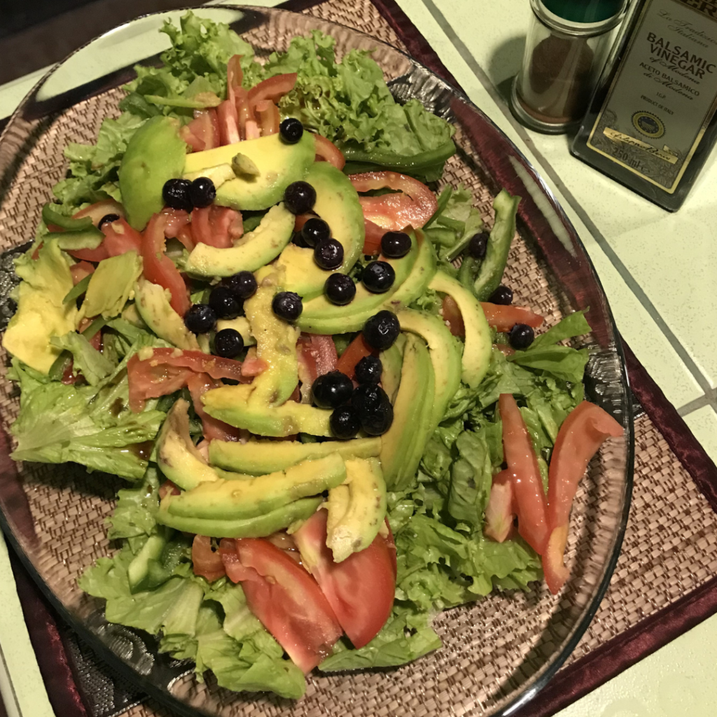 a plate of salad on a counter